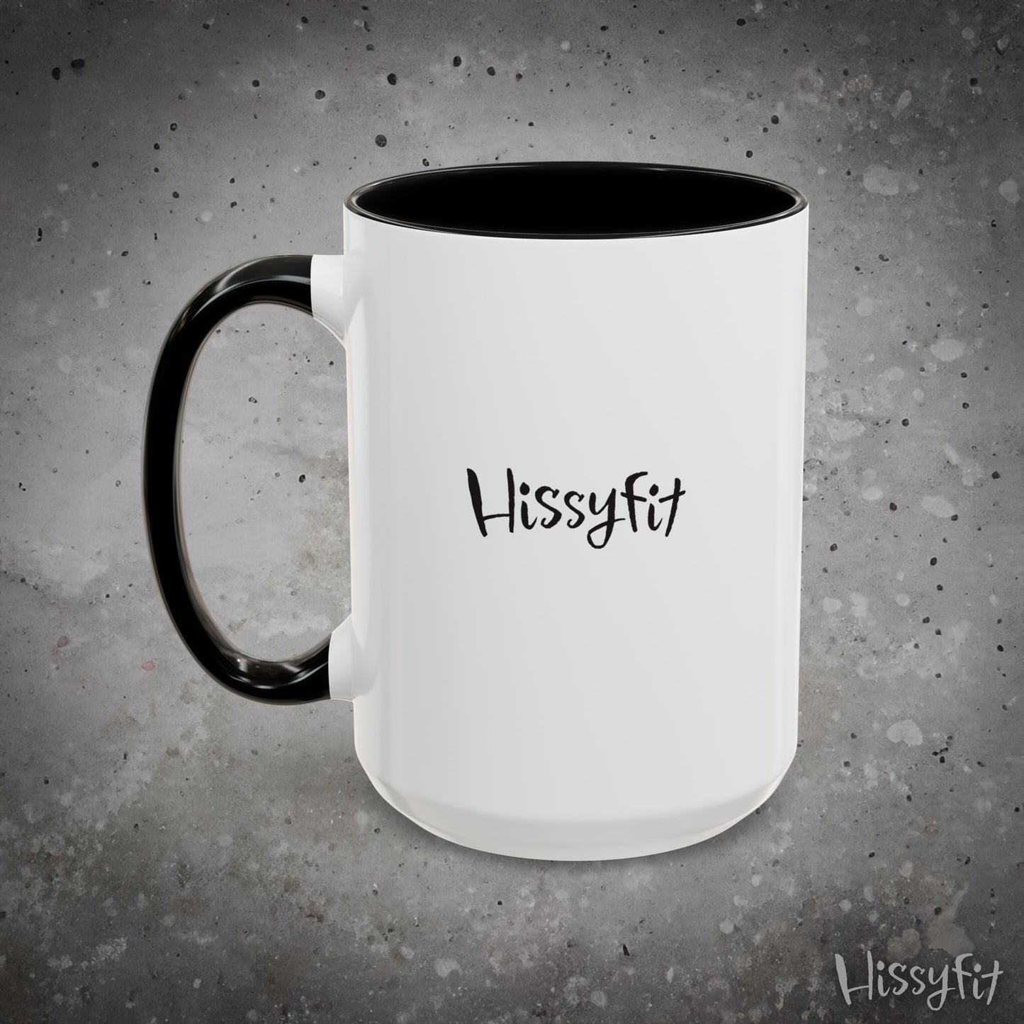 White mug with black interior and handle on a gray background, featuring the word 'Hissyfit'.