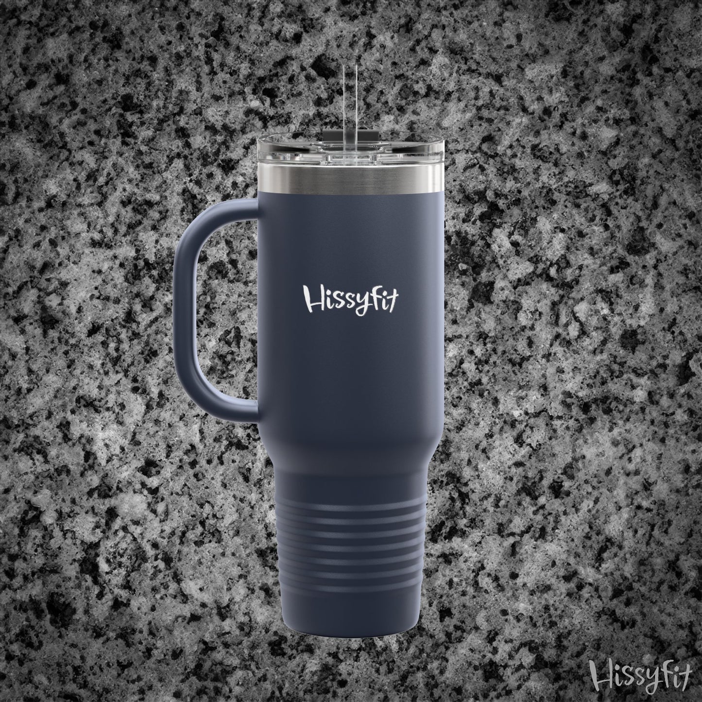 Navy Blue travel mug with handle on a gray granite background