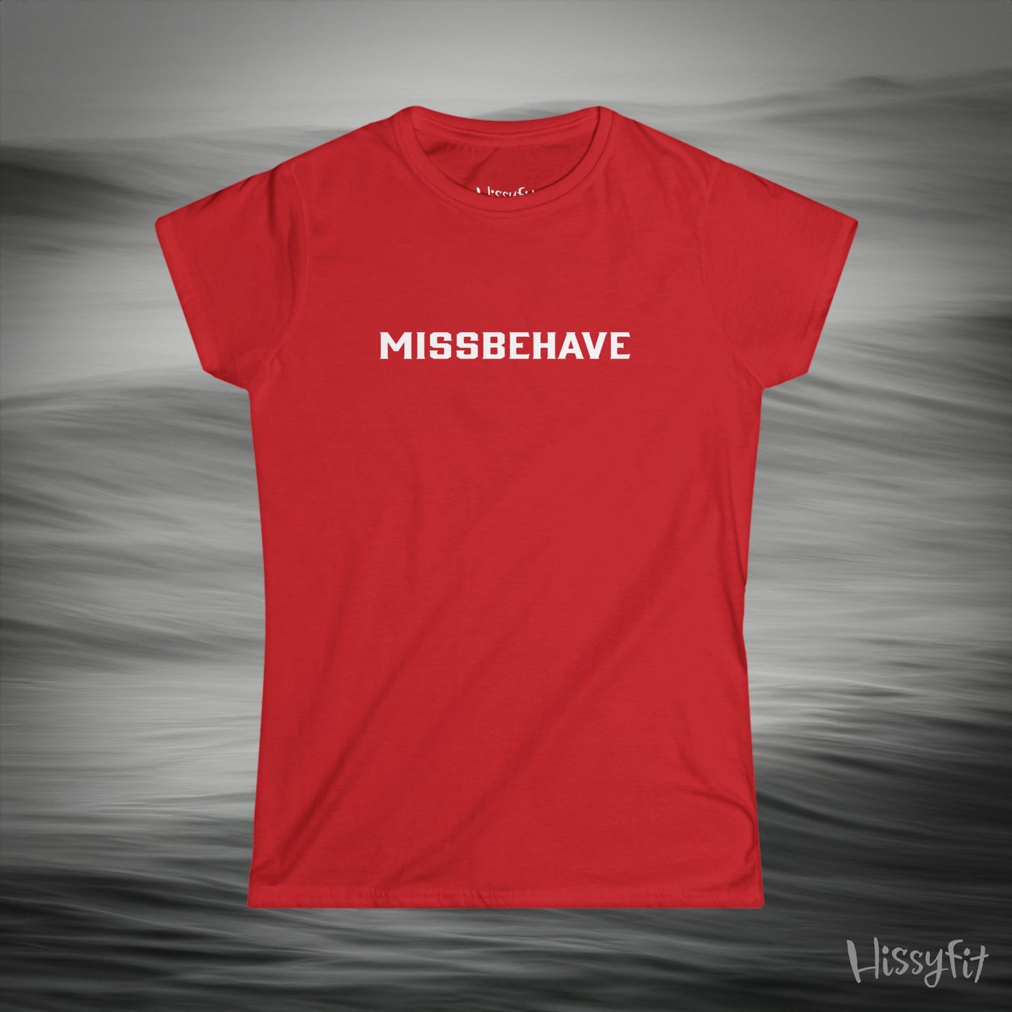 Red t-shirt with 'MISSBEHAVE' text on a gray background