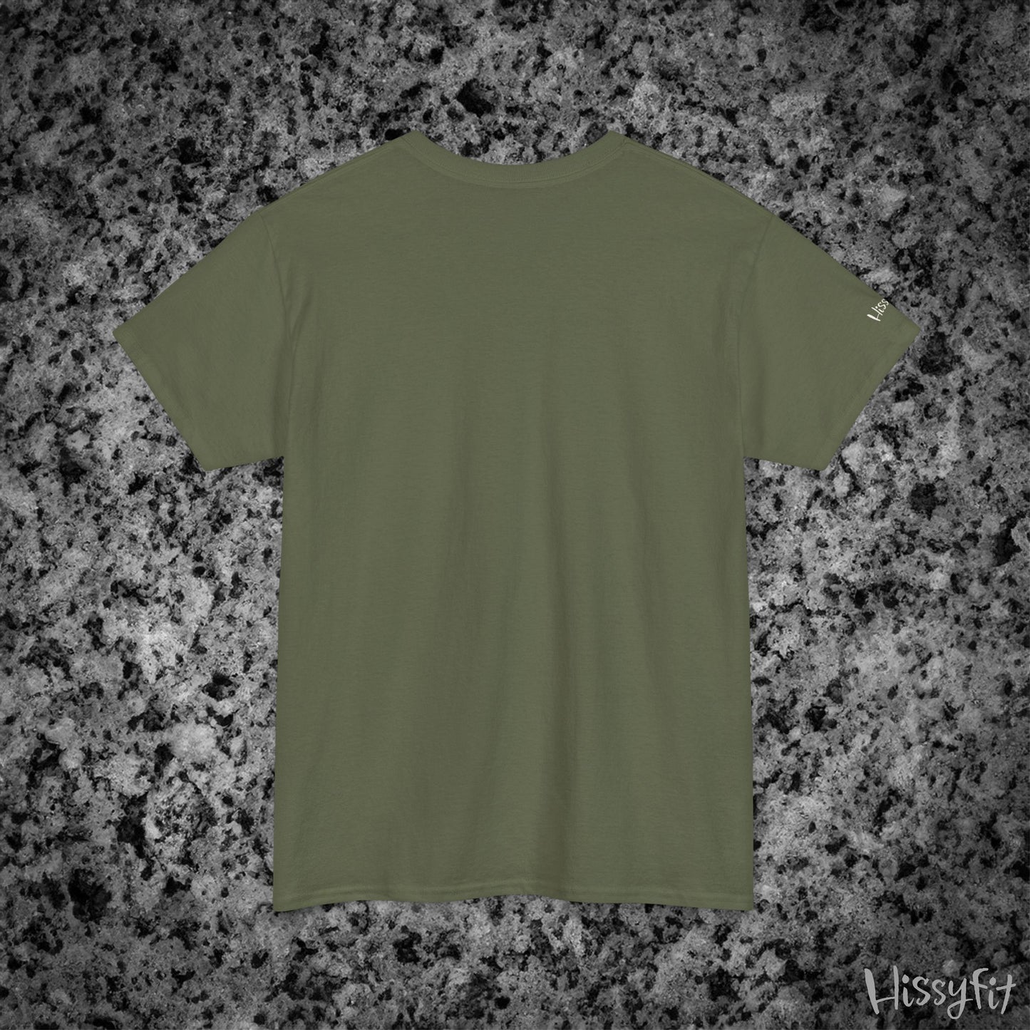 Green t-shirt on a gray and black speckled surface with 'Hissyfit' branding.