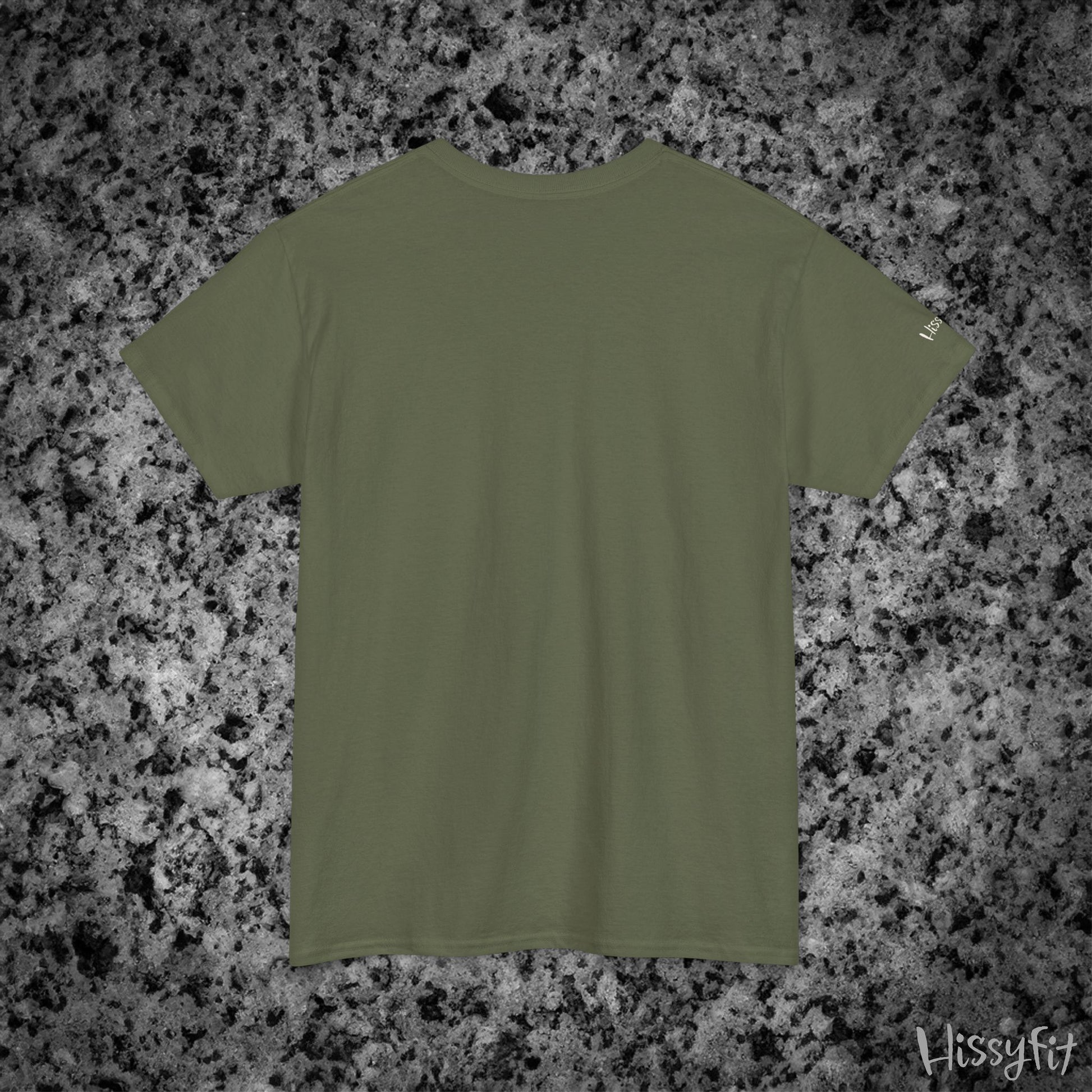 Green t-shirt on a gray and black speckled surface with 'Hissyfit' branding.