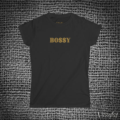 Black t-shirt with 'BOSSY' in gold on a textured gray background
