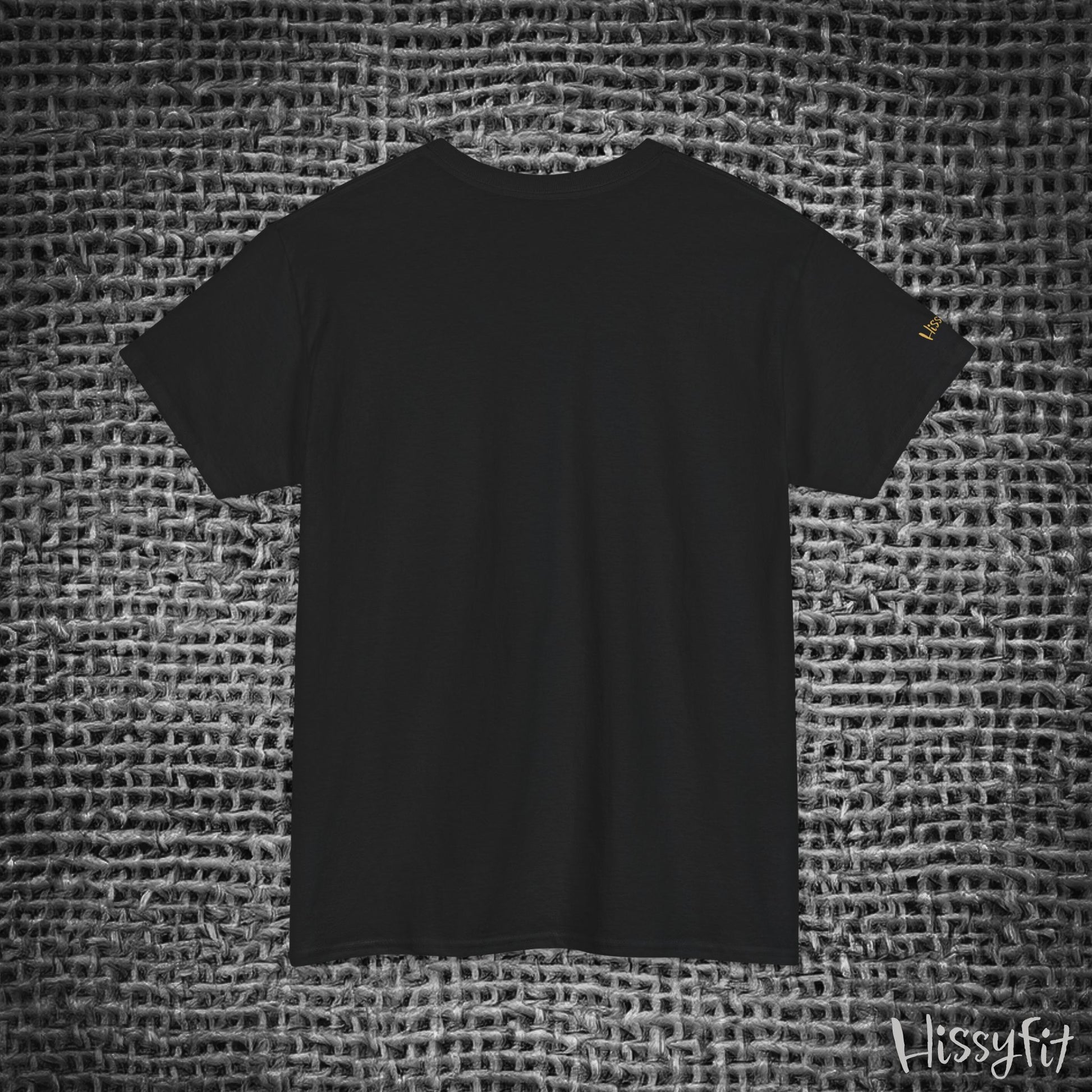 Black t-shirt on a textured gray background