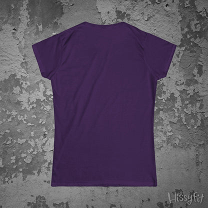 Purple t-shirt on a textured gray background