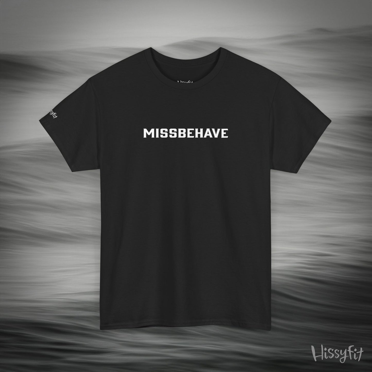 Black t-shirt with 'MISSBEHAVE' text on a gray background