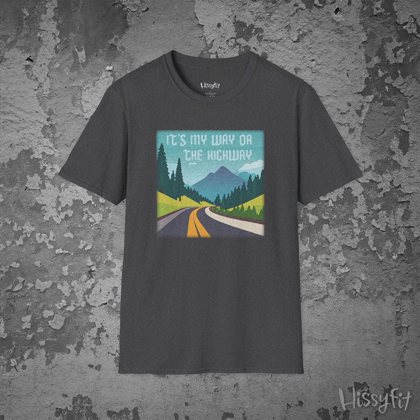 Gray t-shirt with a graphic design of a road and mountains and text 'It's my way or the highway' on a textured gray background