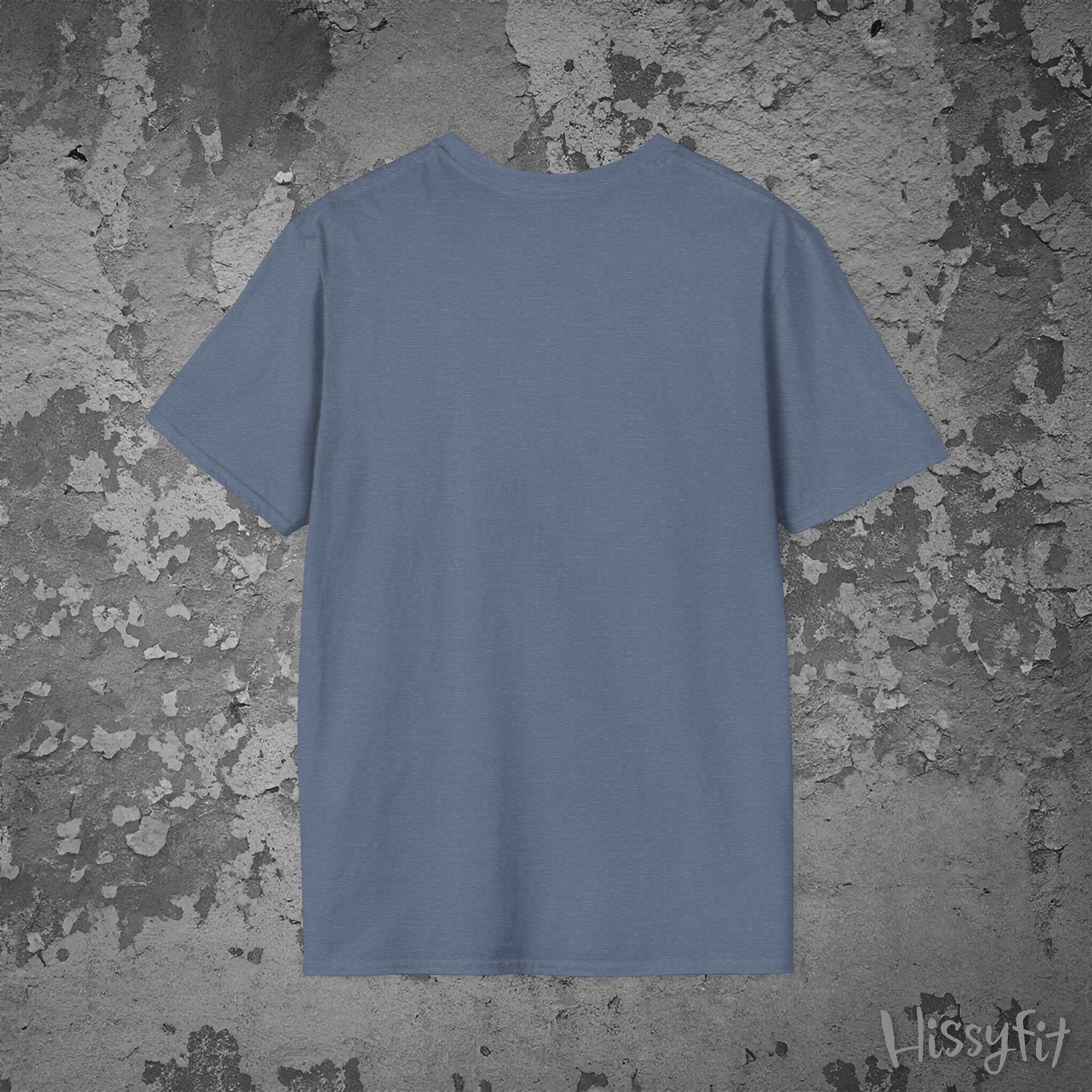 Plain blue t-shirt on a textured gray background