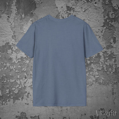 Plain blue t-shirt on a textured gray background