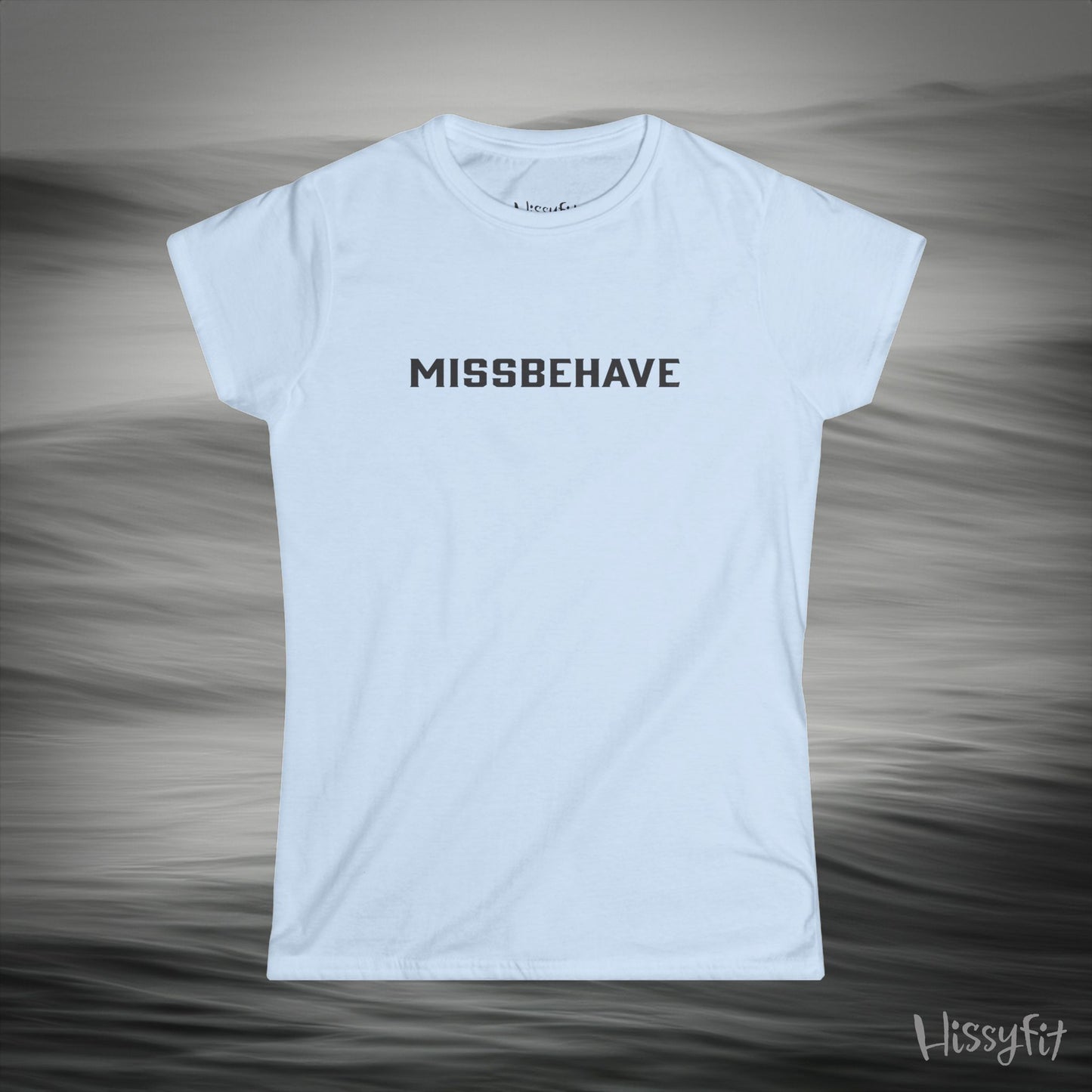 Light blue t-shirt with 'MISSBEHAVE' text on a gray background