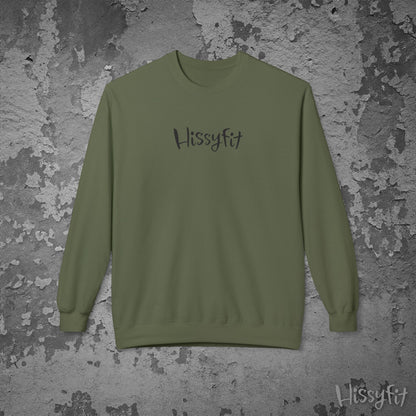 Green sweatshirt with 'Hissyfit' text on a textured gray background