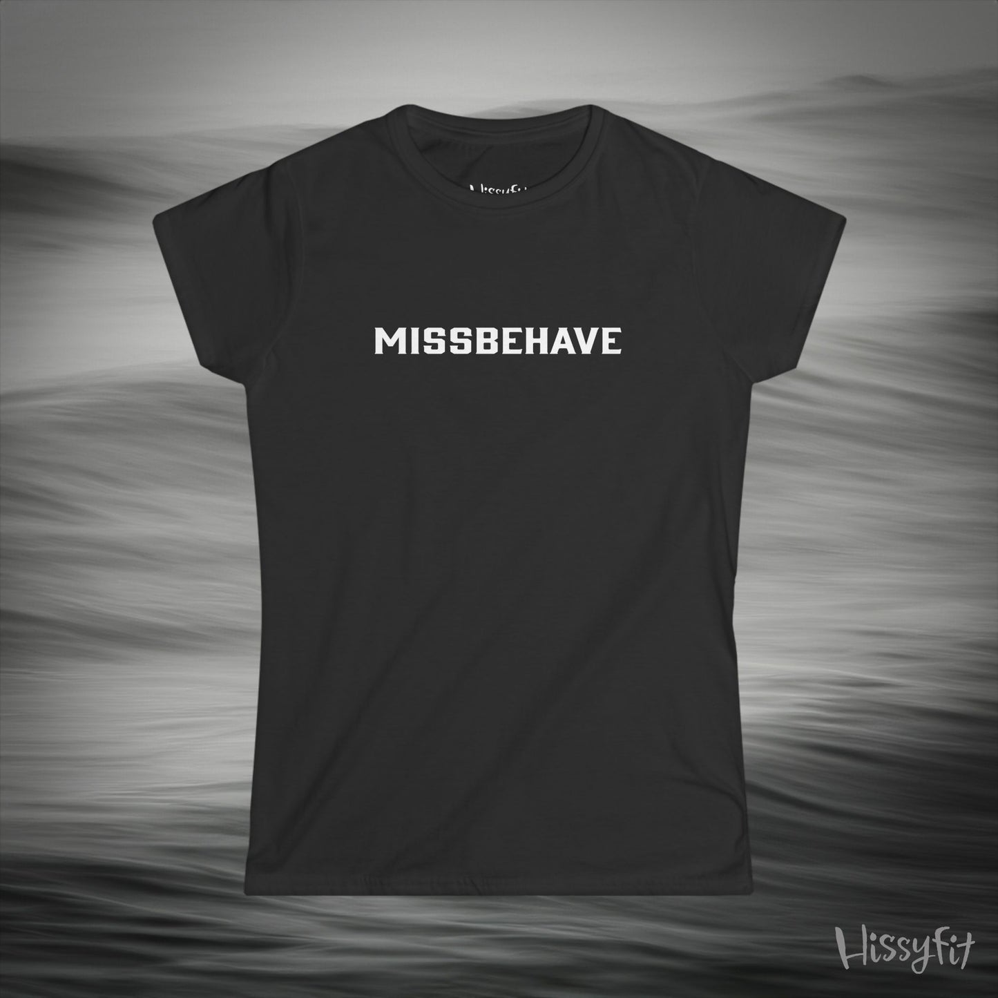 Black t-shirt with 'MISSBEHAVE' text on a gray background