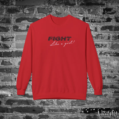 Red sweatshirt with 'Fight Like a Girl' text on a textured black and white background