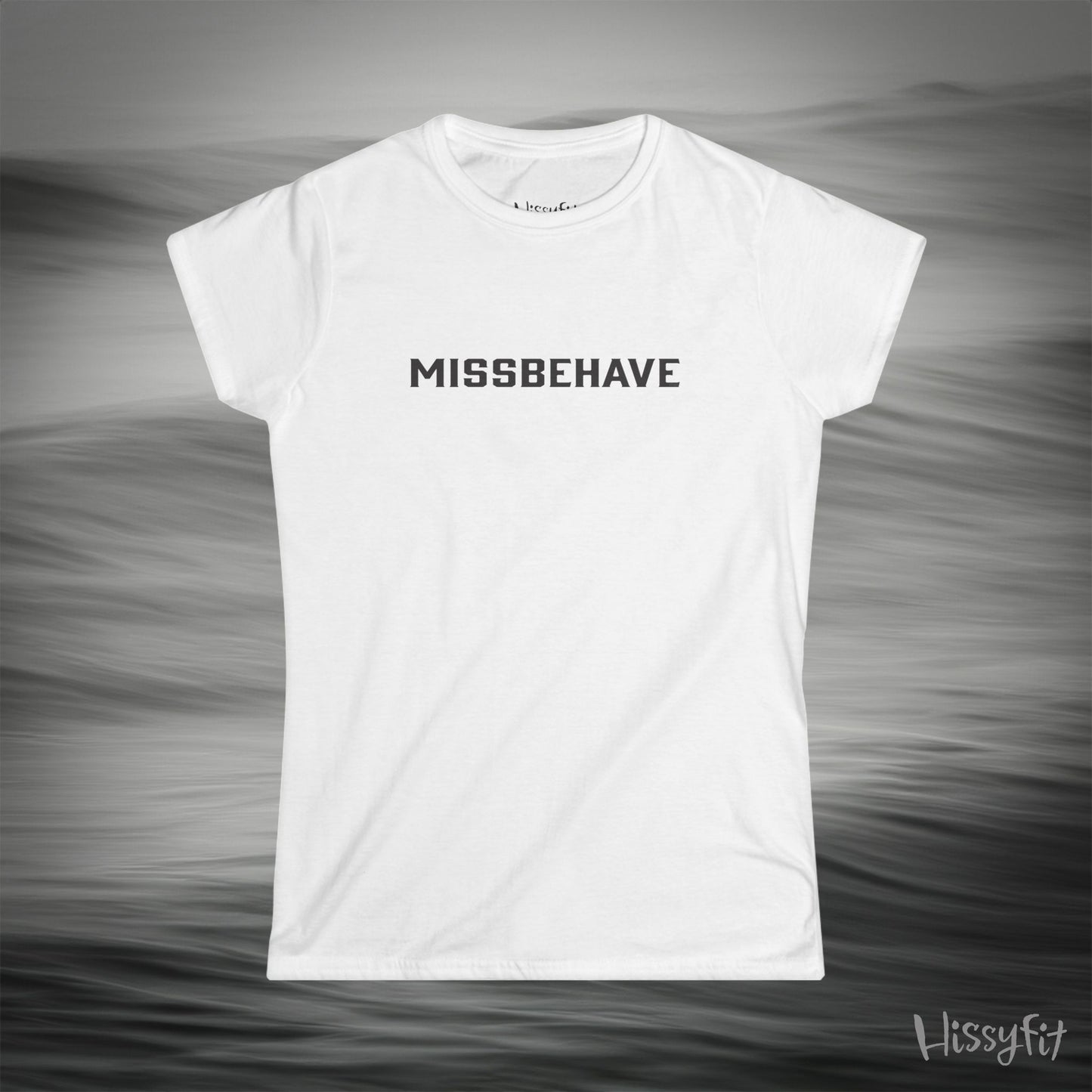 White t-shirt with 'MISSBEHAVE' text on a gray background