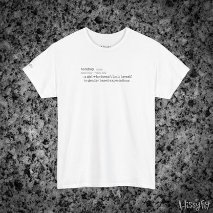 White t-shirt with text 'Tomboy:definition' on a gray and black speckled background, featuring the brand 'Hissyfit'.
