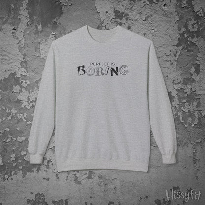 Gray sweatshirt with 'Perfect is Boring' text on a textured gray background