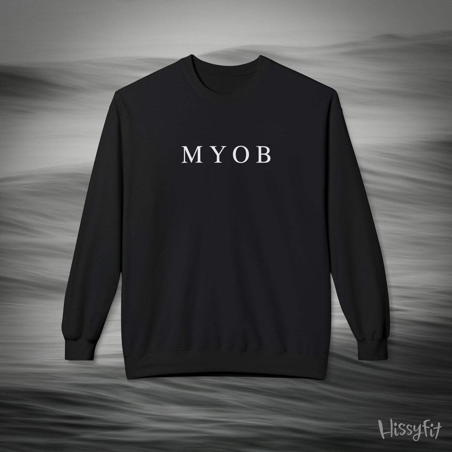 Black sweatshirt with 'MYOB' text on a gray background