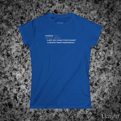 Blue t-shirt with text 'Tomboy:definition' on a gray granite surface, featuring the brand 'Hissyfit'.