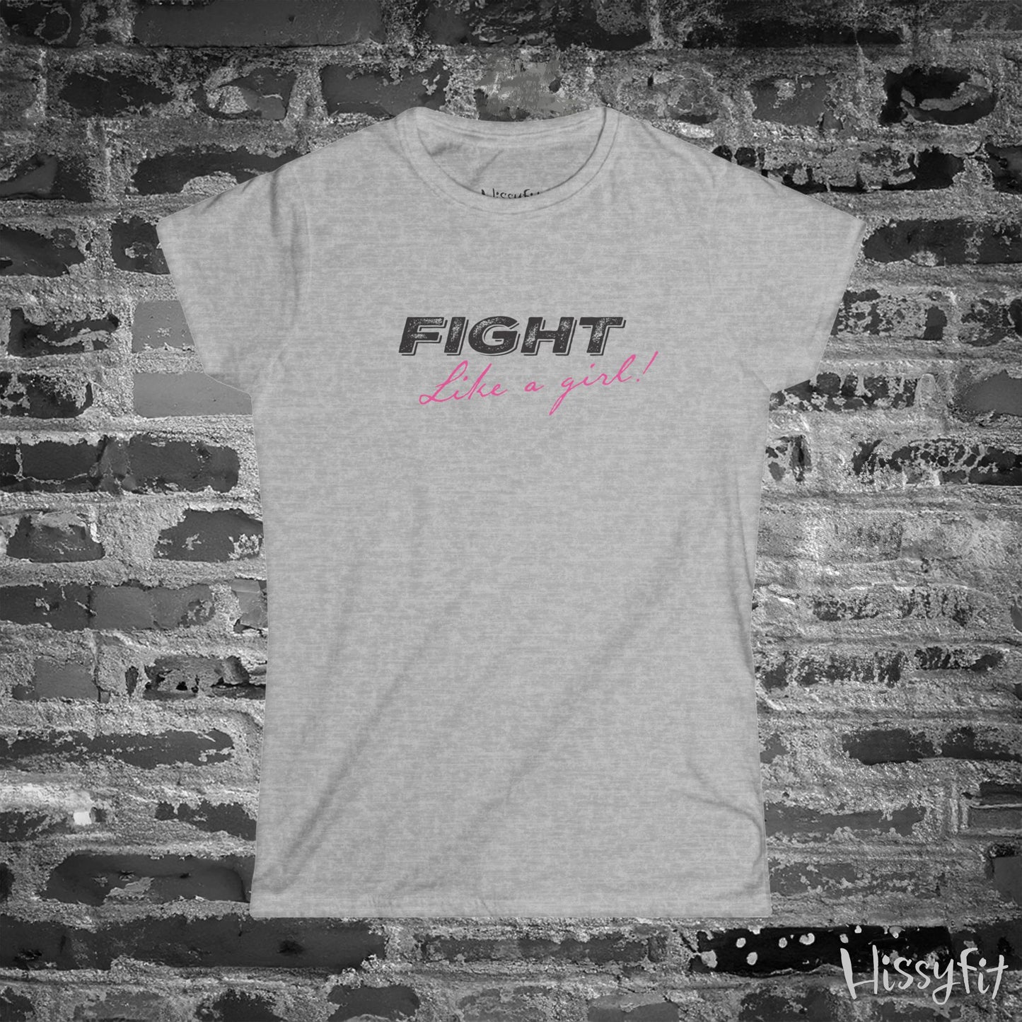 Light Gray t-shirt with 'Fight Like a Girl' text on a brick wall background