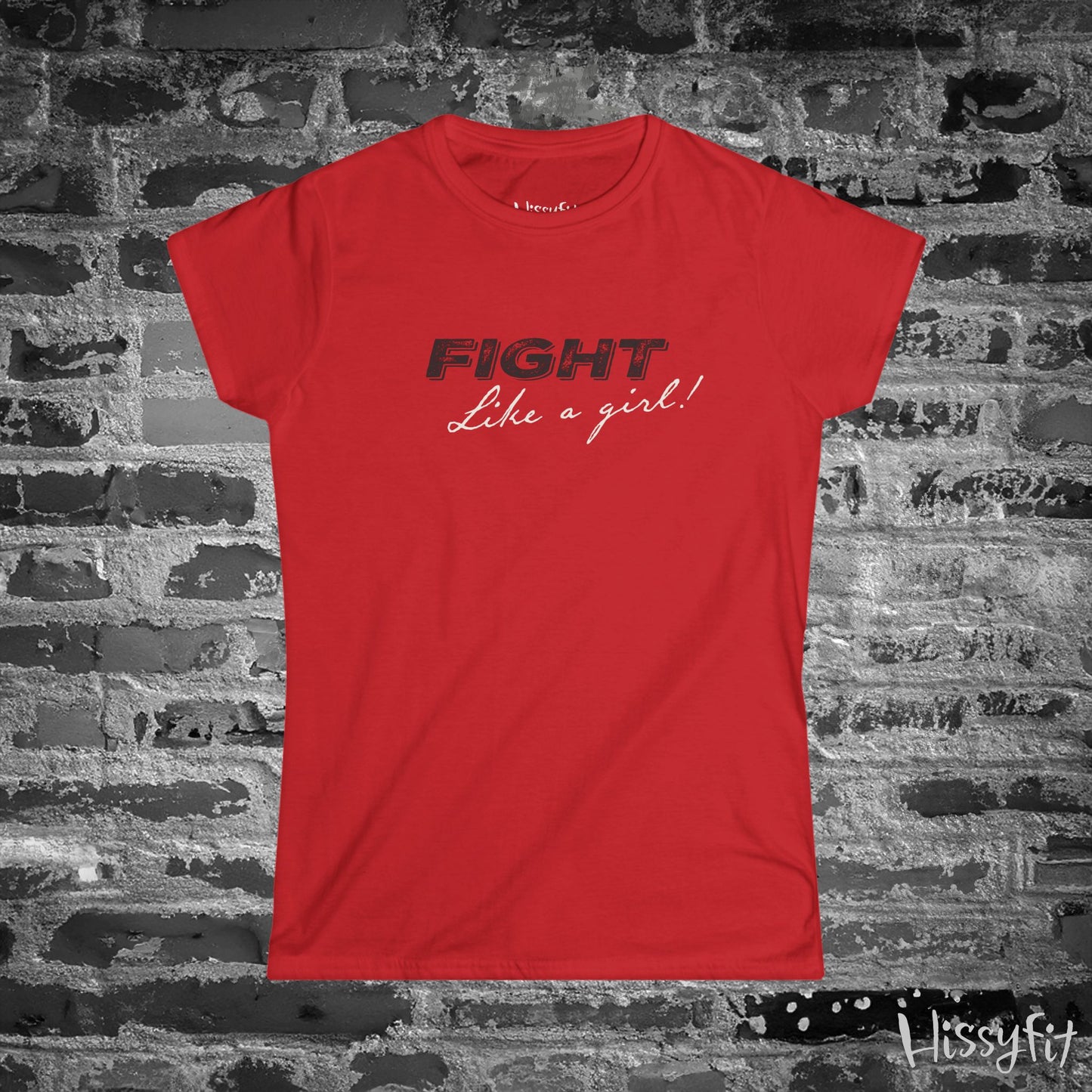 Red t-shirt with 'Fight Like a Girl!' text on a brick wall background