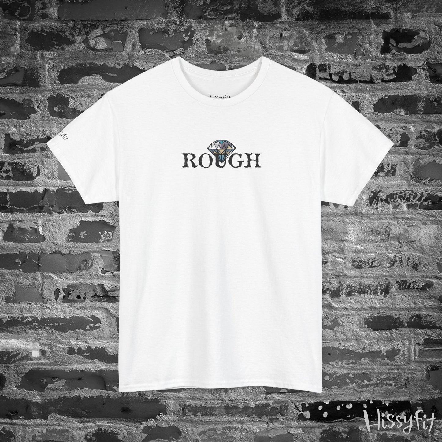 White t-shirt with 'ROUGH' text and diamond graphic on a brick wall background