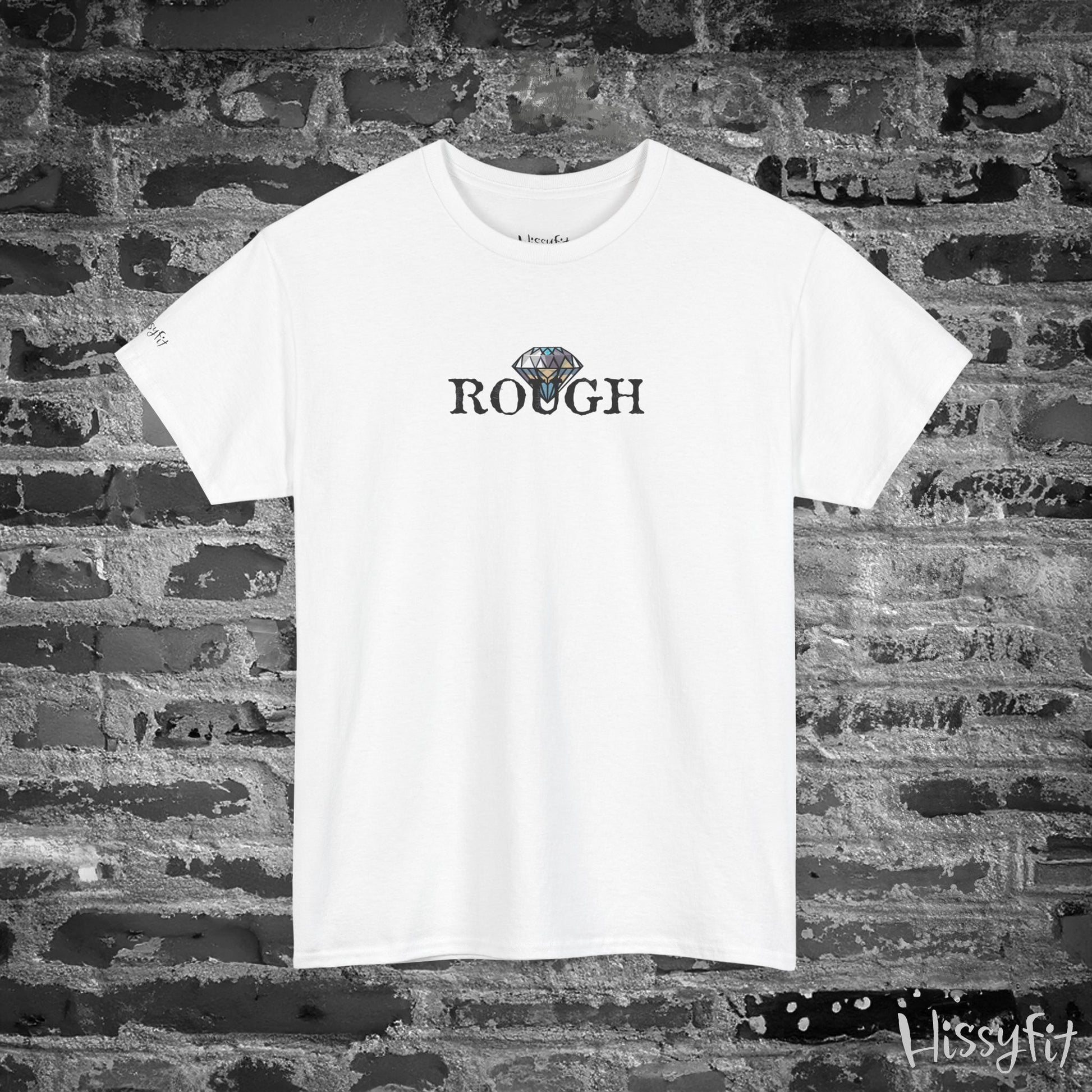 White t-shirt with 'ROUGH' text and diamond graphic on a brick wall background