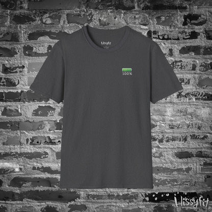 Gray t-shirt with a green battery symbol displaying '100 percent charged' on a brick wall background