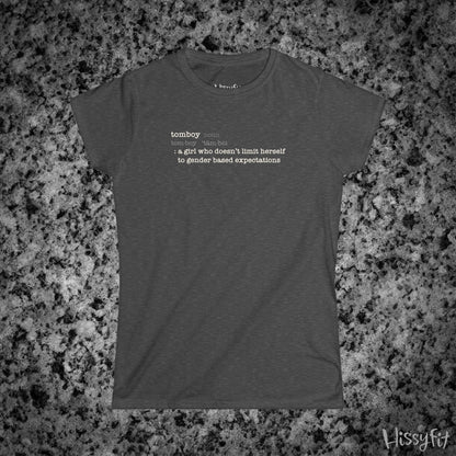 Gray t-shirt with text 'Tomboy:definition' on a gray granite surface, featuring the brand 'Hissyfit'.