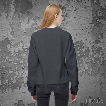 Person wearing a dark gray sweatshirt against a textured gray wall with 'Hissyfit' branding.