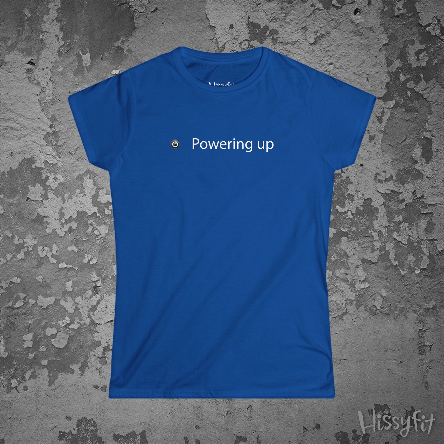 Blue t-shirt with 'Powering up' text on a textured gray background