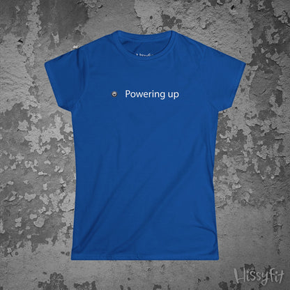 Blue t-shirt with 'Powering up' text on a textured gray background