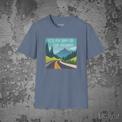 Blue t-shirt with a graphic design of a road and mountains and text 'It's my way or the highway' on a textured gray background