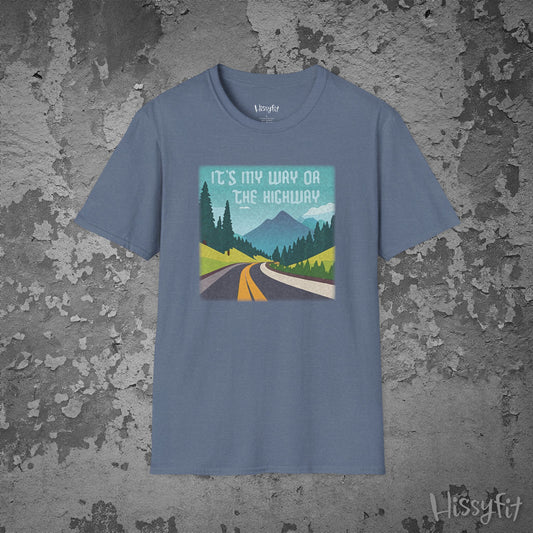 Blue t-shirt with a graphic design of a road and mountains and text 'It's my way or the highway' on a textured gray background