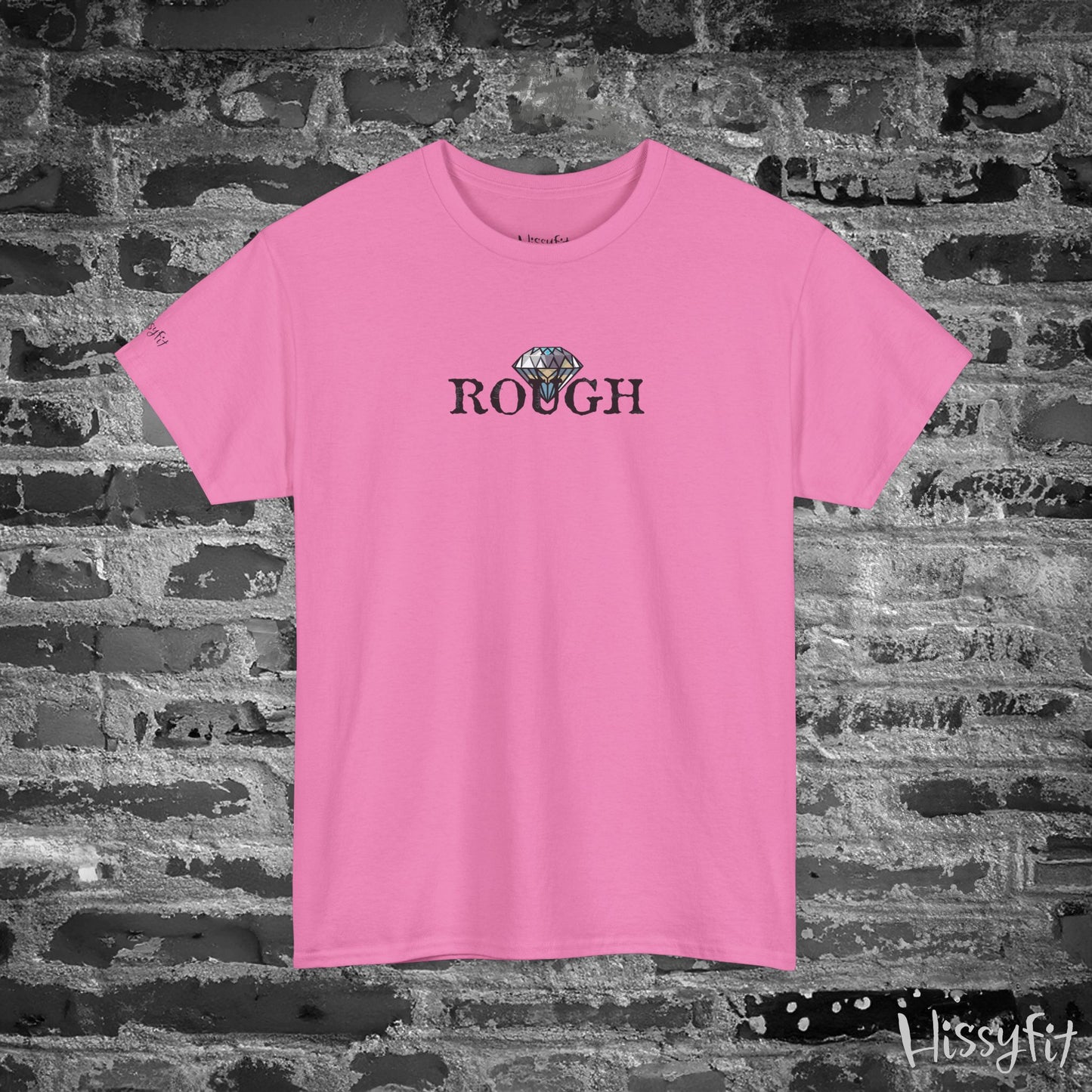 Pink t-shirt with 'ROUGH' text and a diamond graphic on a textured black and gray background