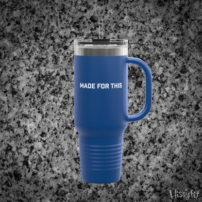 Blue travel mug with 'MADE FOR THIS' text on a gray granite background