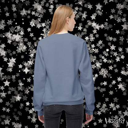 Person wearing a blue sweatshirt with a starry patterned background