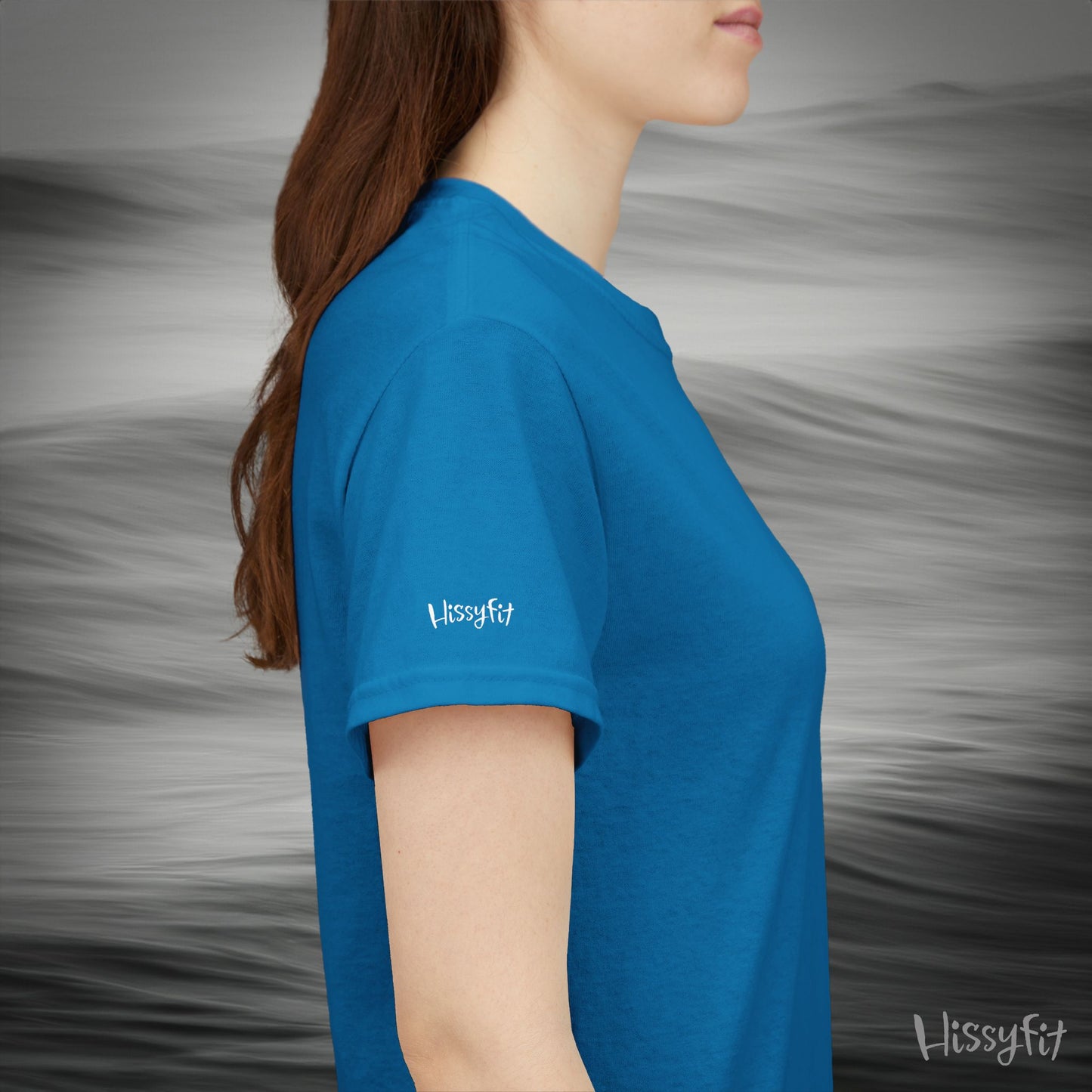Person wearing a blue Hissyfit t-shirt against a gray background