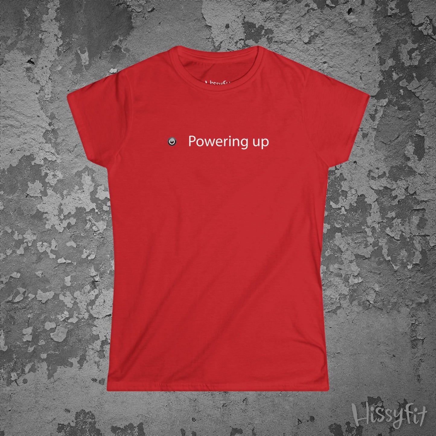 Red t-shirt with 'Powering up' text on a textured gray background