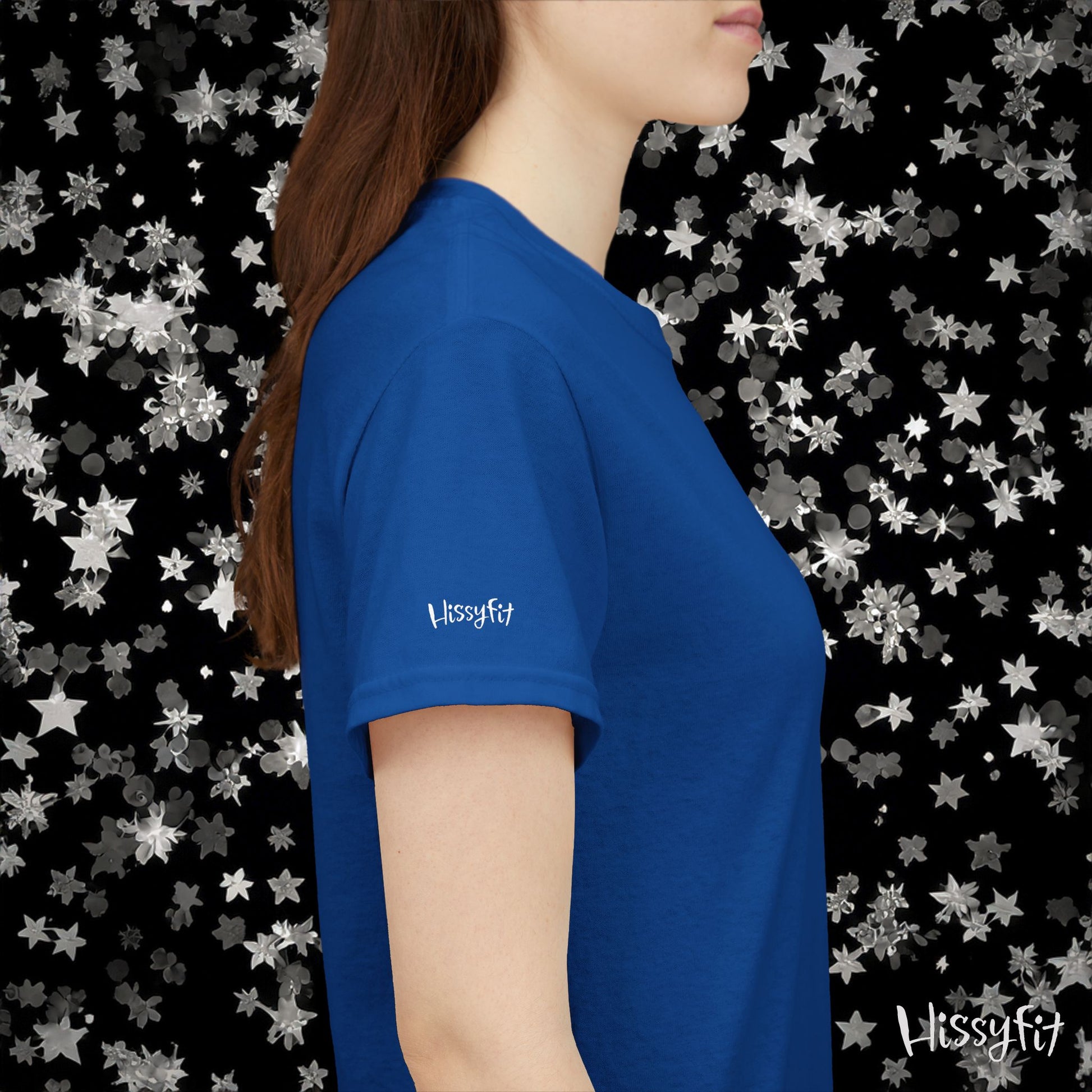 Person wearing a blue Hissyfit t-shirt against a star-patterned background