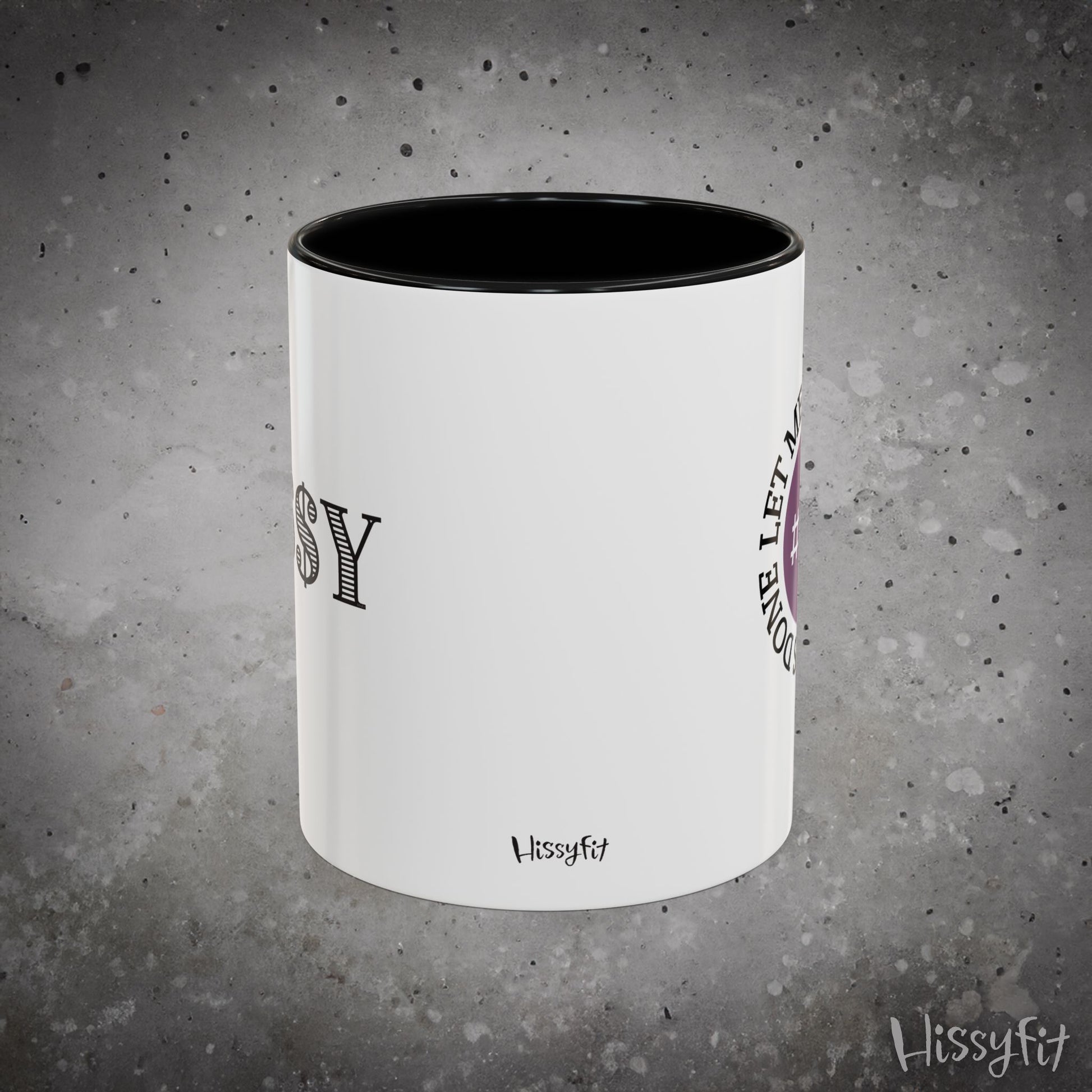 White mug with black interior on a gray textured background, featuring 'Hissyfit' branding.