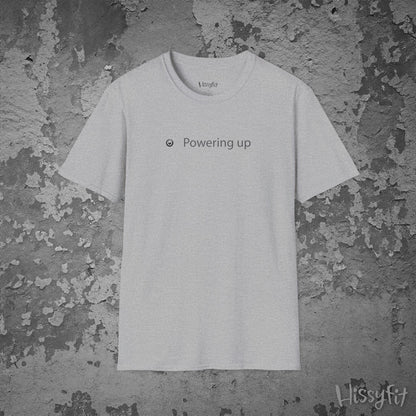 White t-shirt with 'Powering up' text on a textured gray background