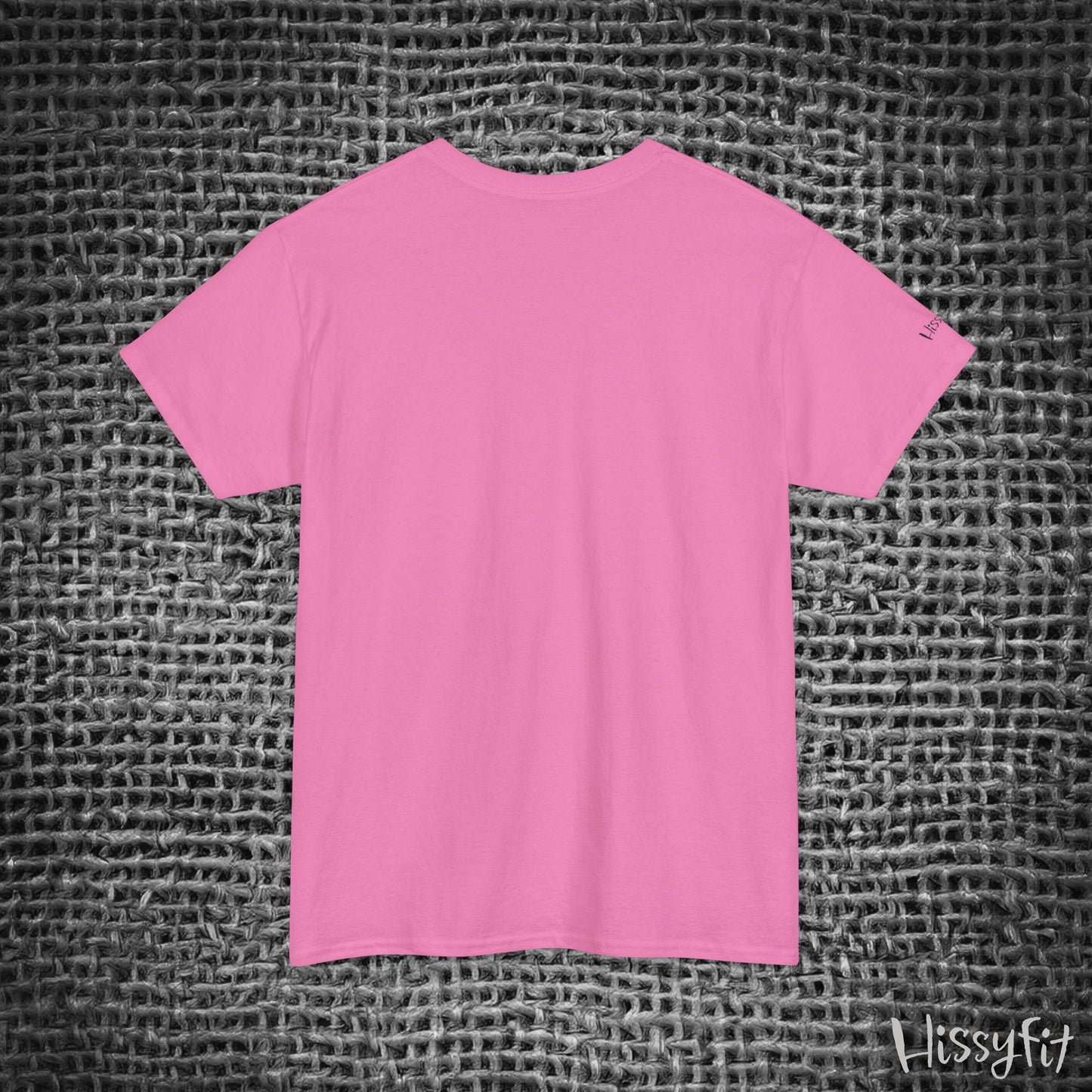 Pink t-shirt on a textured gray background