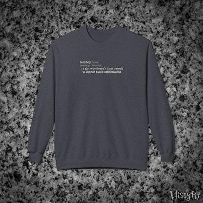 Gray sweatshirt with text definition of "Tomboy" on a gray and black speckled background