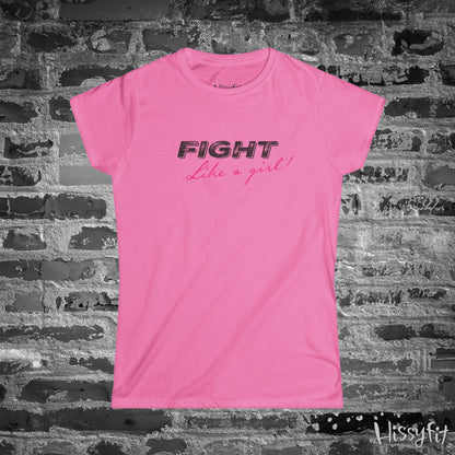 Pink t-shirt with 'Fight Like a Girl' text on a brick wall background
