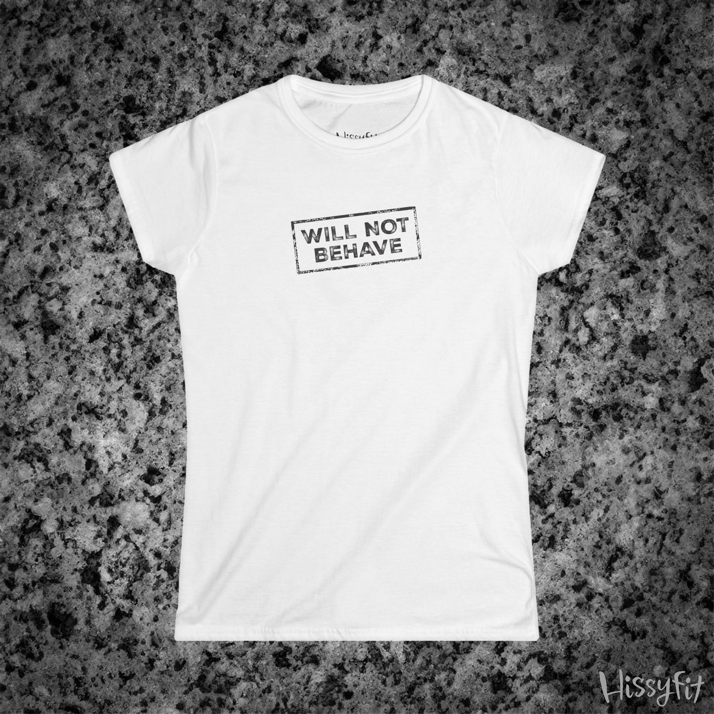 White t-shirt with 'WILL NOT BEHAVE' text on a textured gray background