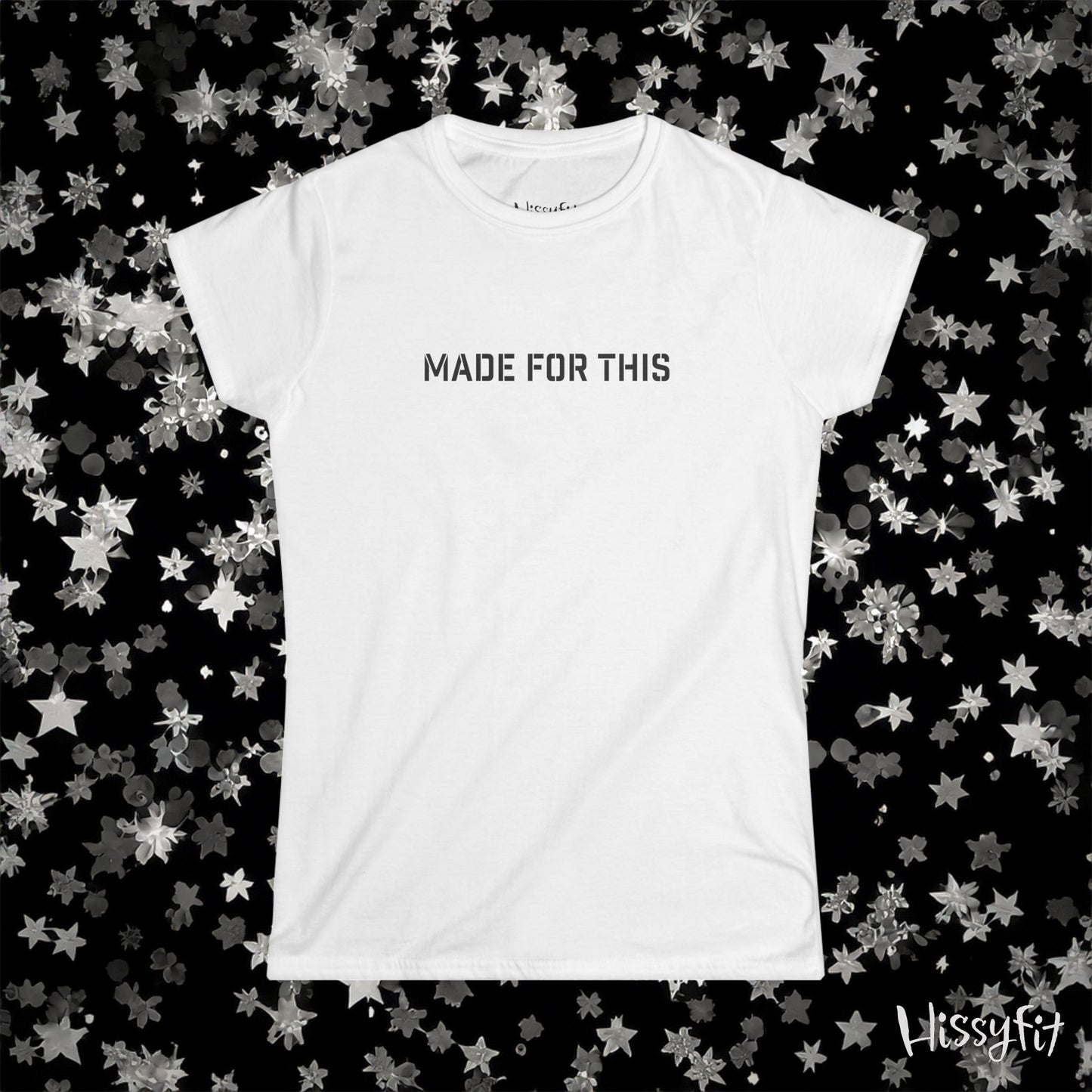 White t-shirt with 'MADE FOR THIS' text on a black background with star patterns, featuring the brand 'Hissyfit'.