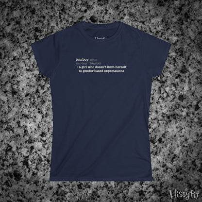 Navy blue t-shirt with text 'Tomboy:definition' on a gray granite surface, featuring the brand 'Hissyfit'.