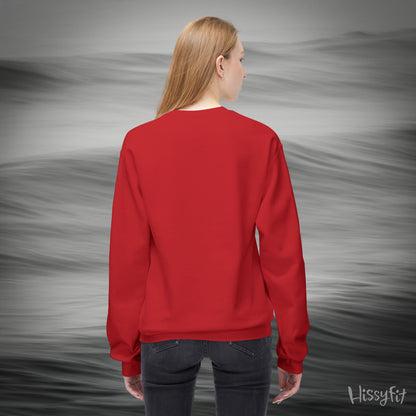 Person wearing a red sweatshirt with a gray background