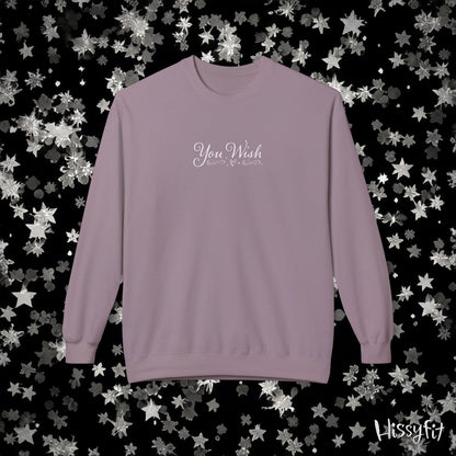 Purple sweatshirt with 'You Wish' text on a star-patterned background