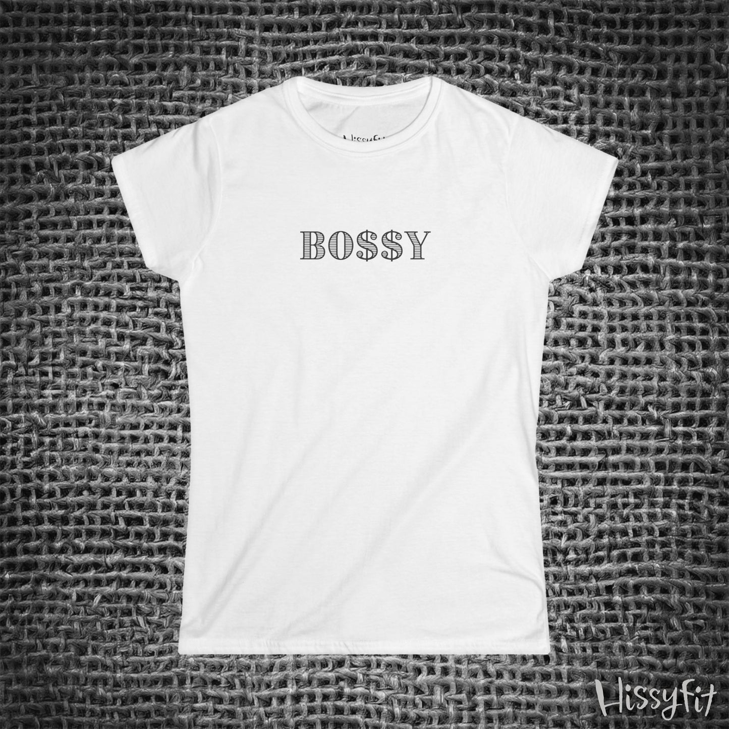 White t-shirt with 'BOSSY' text on a textured gray background