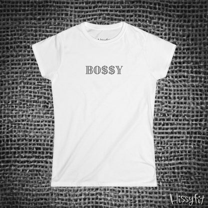 White t-shirt with 'BOSSY' text on a textured gray background
